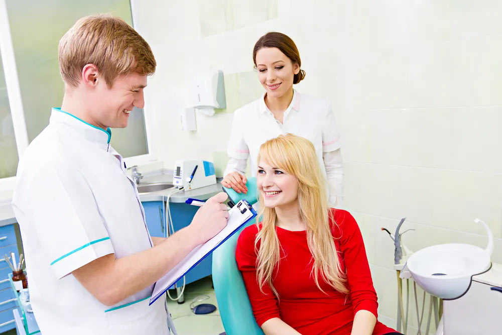 dental doctors with patient