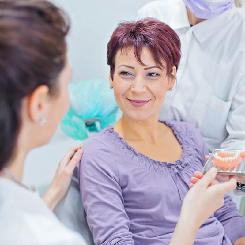 lady smiling at dentist